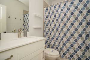 Bathroom full tub and shower next to bunk room