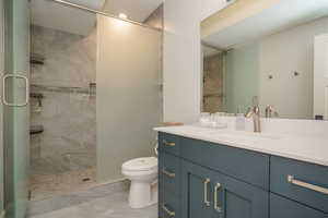Gorgeous ensuite bathroom off of Downstairs Primary
