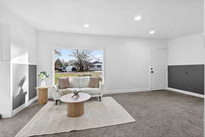 Sitting room featuring carpet flooring and recessed lighting