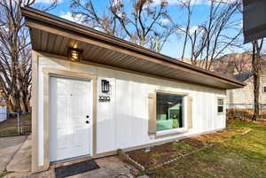 Entrance to property with board and batten siding