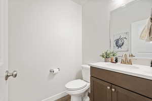 Bathroom with vanity and light wood-style flooring