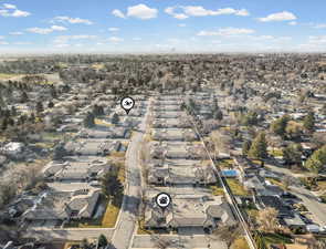 Aerial overview of property's location with nearby suburban area