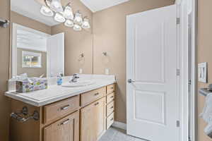 Bathroom featuring vanity and light tile patterned floors