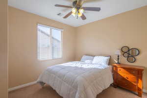 Bedroom with carpet floors and ceiling fan