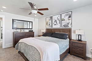 Bedroom featuring ceiling fan, carpet flooring, and recessed lighting
