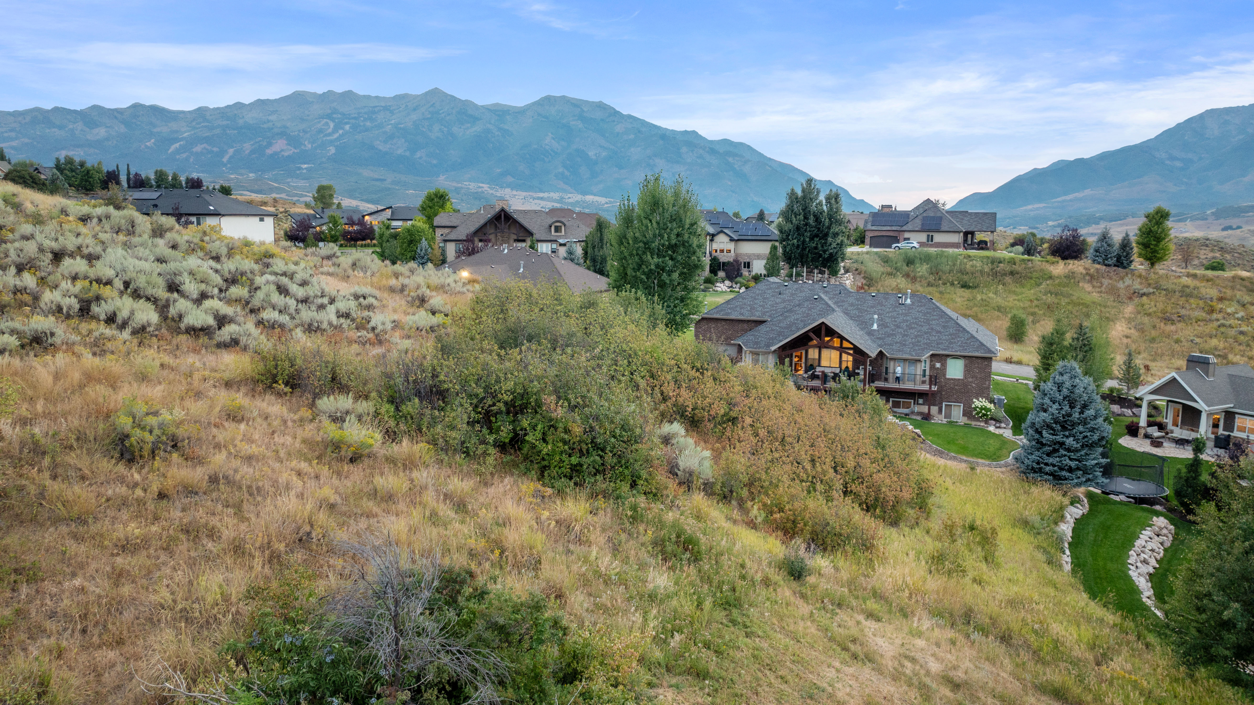 Mountain view featuring nearby suburban area