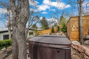 View of yard featuring a hot tub