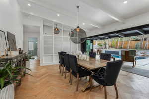 Dining area featuring recessed lighting and vaulted ceiling
