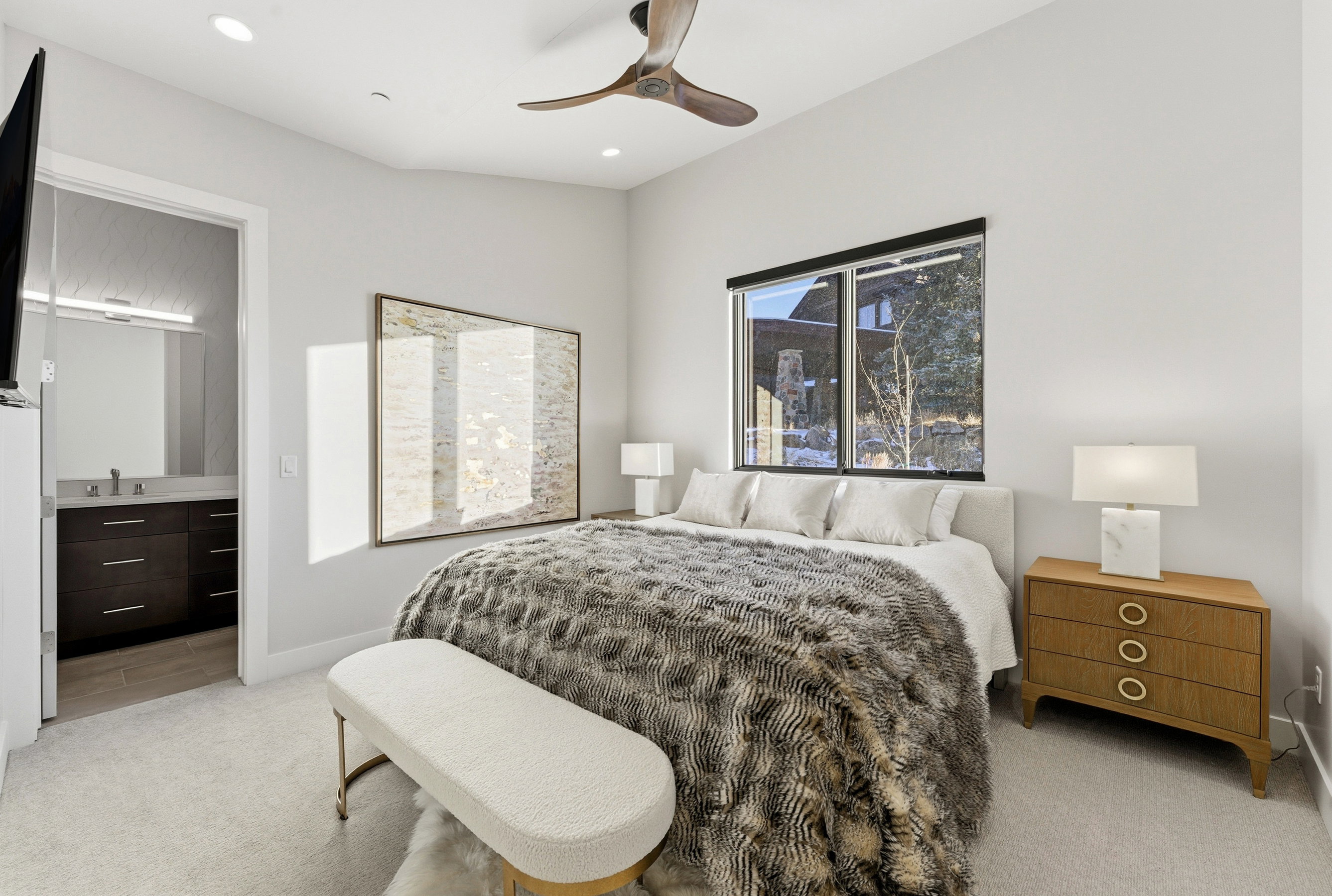 Bedroom featuring a ceiling fan, recessed lighting, and a large window