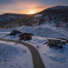 Snowy aerial view with a mountain view