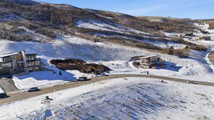 Snowy aerial view with a mountain view