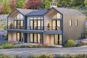 Rear view of house with a balcony