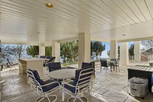 View of patio featuring outdoor dining area