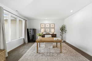 Office area featuring carpet and recessed lighting