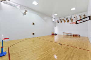 View of sport court with basketball hoop