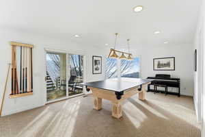 Rec room featuring carpet floors and recessed lighting