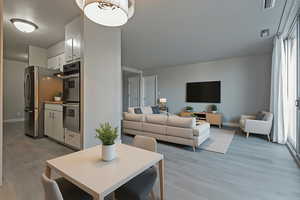 Living room featuring light wood-type flooring
