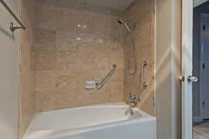 Bathroom featuring  shower combination