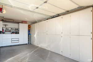 Garage with a garage door opener and loads of built-ins!