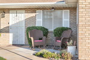 Entrance to property with seating area out front to enjoy the evening sunset.