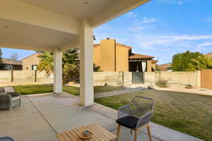 Fenced backyard featuring a patio