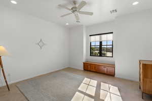 Empty room with recessed lighting, a ceiling fan, and light tile patterned floors