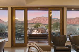 Entryway featuring a mountain view, tile patterned floors, and recessed lighting
