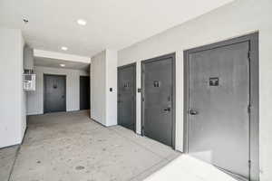 Doorway to property with water heater