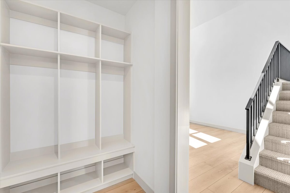 Built-in storage cubbies featuring an integrated bench