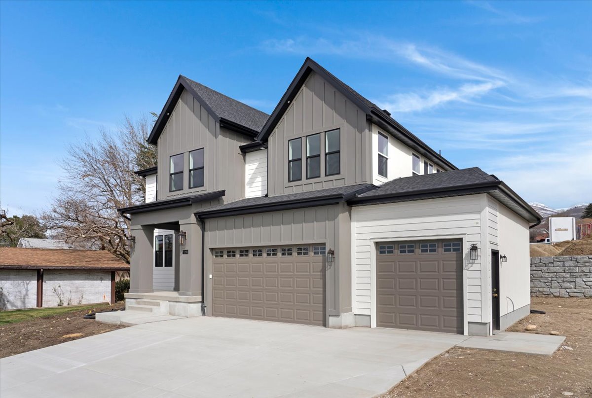 Modern farmhouse-style exterior with board and batten siding