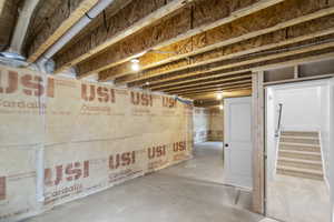 Unfinished below grade area with stairway