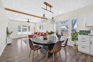 Dining area featuring recessed lighting, dark wood-style flooring, a textured ceiling, and ceiling fan