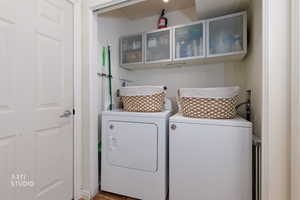 Laundry area with washer and dryer and cabinet space
