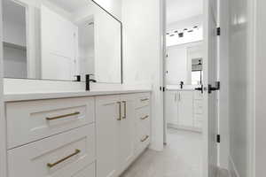 Full bathroom featuring vanity
