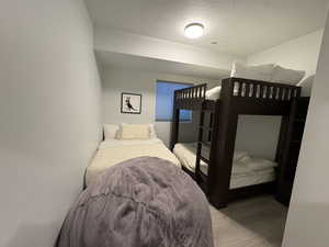 Bedroom featuring a textured ceiling