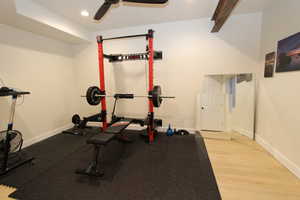 Workout area featuring recessed lighting, ceiling fan, and light wood-type flooring