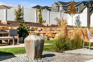 View of fountain and rock wall