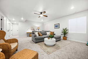 Family room featuring carpet, recessed lighting, and a ceiling fan