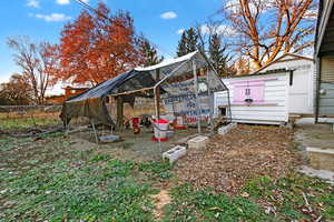 View of yard with an outbuilding and exterior structure