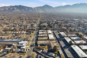 Aerial overview of property's location featuring a mountain backdrop