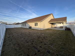 View of backyard and covered patio