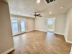 Flex room room with a ceiling fan and wood style tiled floors