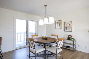 Dining area with wood finished floors