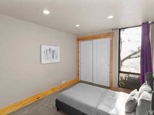 Bedroom with recessed lighting, a closet, and carpet floors
