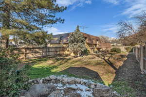 View of fenced backyard