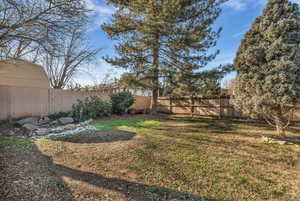 View of fenced backyard