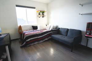 Bedroom featuring laminate floors and a view of Timpanogos Mountain