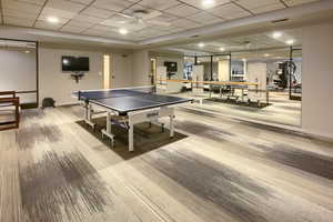 5th level Rec room featuring a paneled ceiling and a ceiling fan