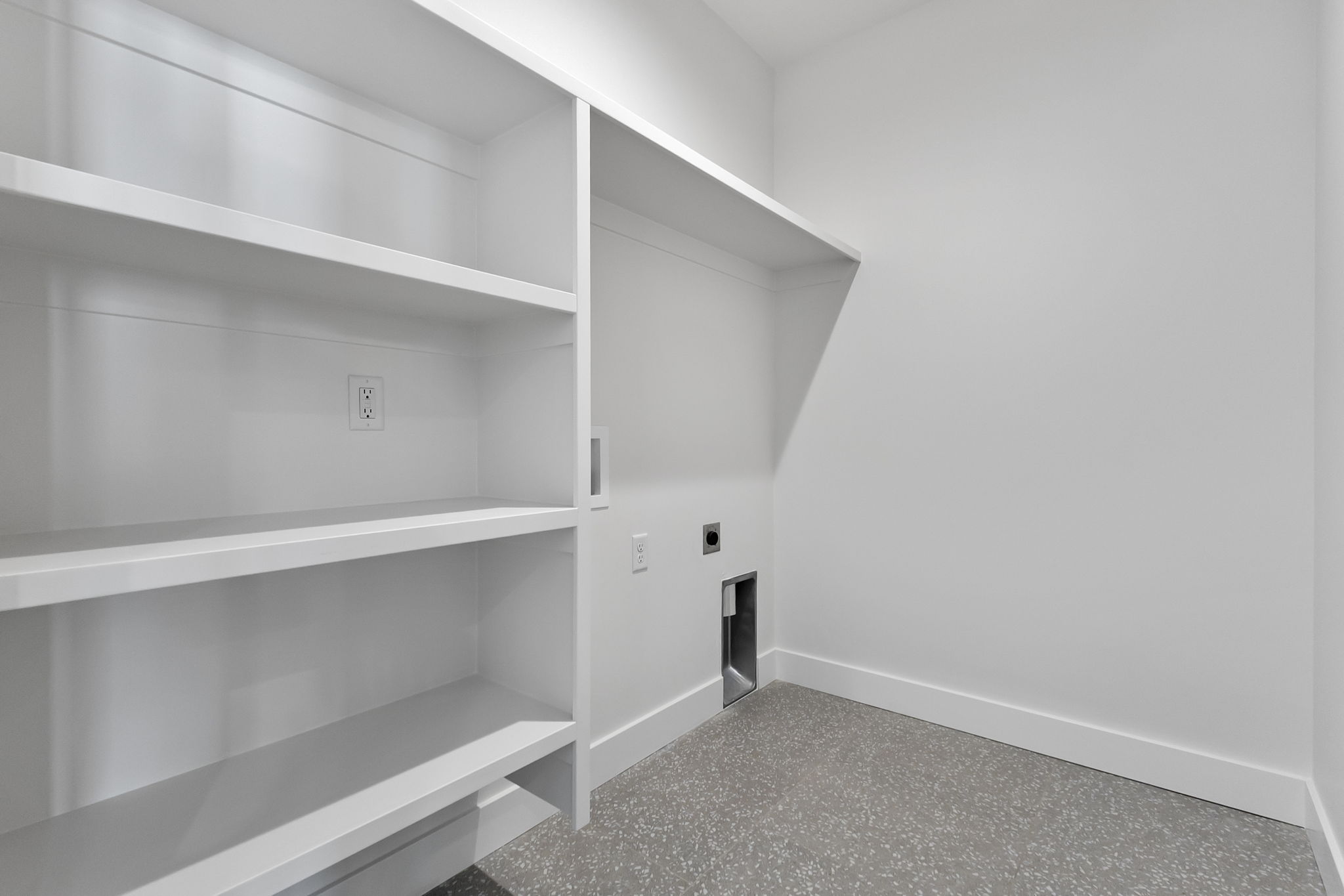 Laundry room with hookup for a washing machine and hookup for an electric dryer