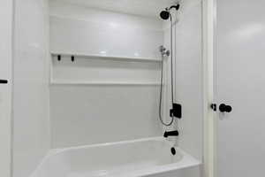 Full bathroom with washtub / shower combination